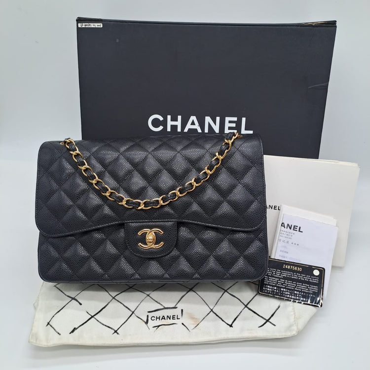 Chanel classic jumbo black caviar seri 24