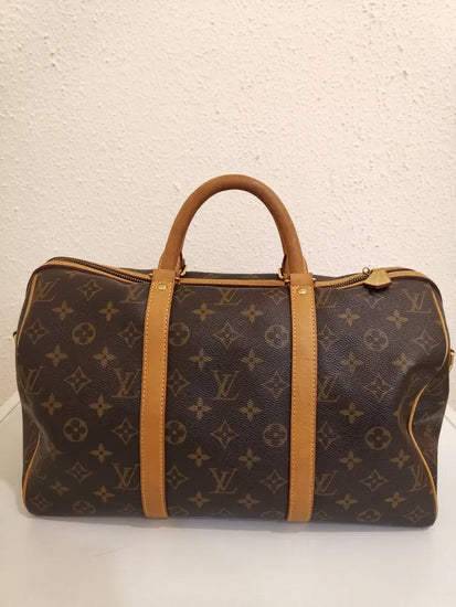 Louis Vuitton Monogram Coppola 35 (2009) Handbag