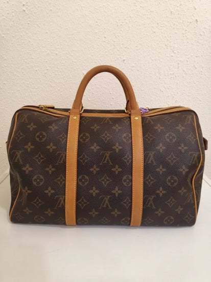 Louis Vuitton Monogram Coppola 35 (2009) Handbag