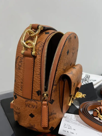 Mcm X Tracy Backpack In Visetos Size Mini Cognac